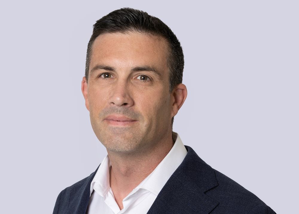 Justin Flitter Headshot 2 - 1000 x 716
